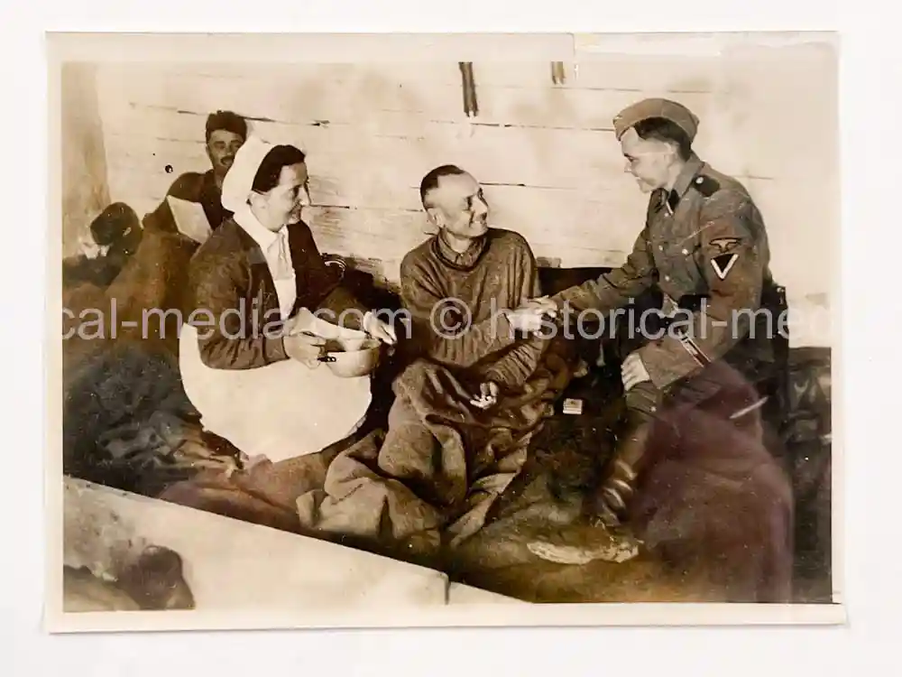 ORIGINAL PRESS PHOTO - WAFFEN-SS FATHER AND SON REUNITE