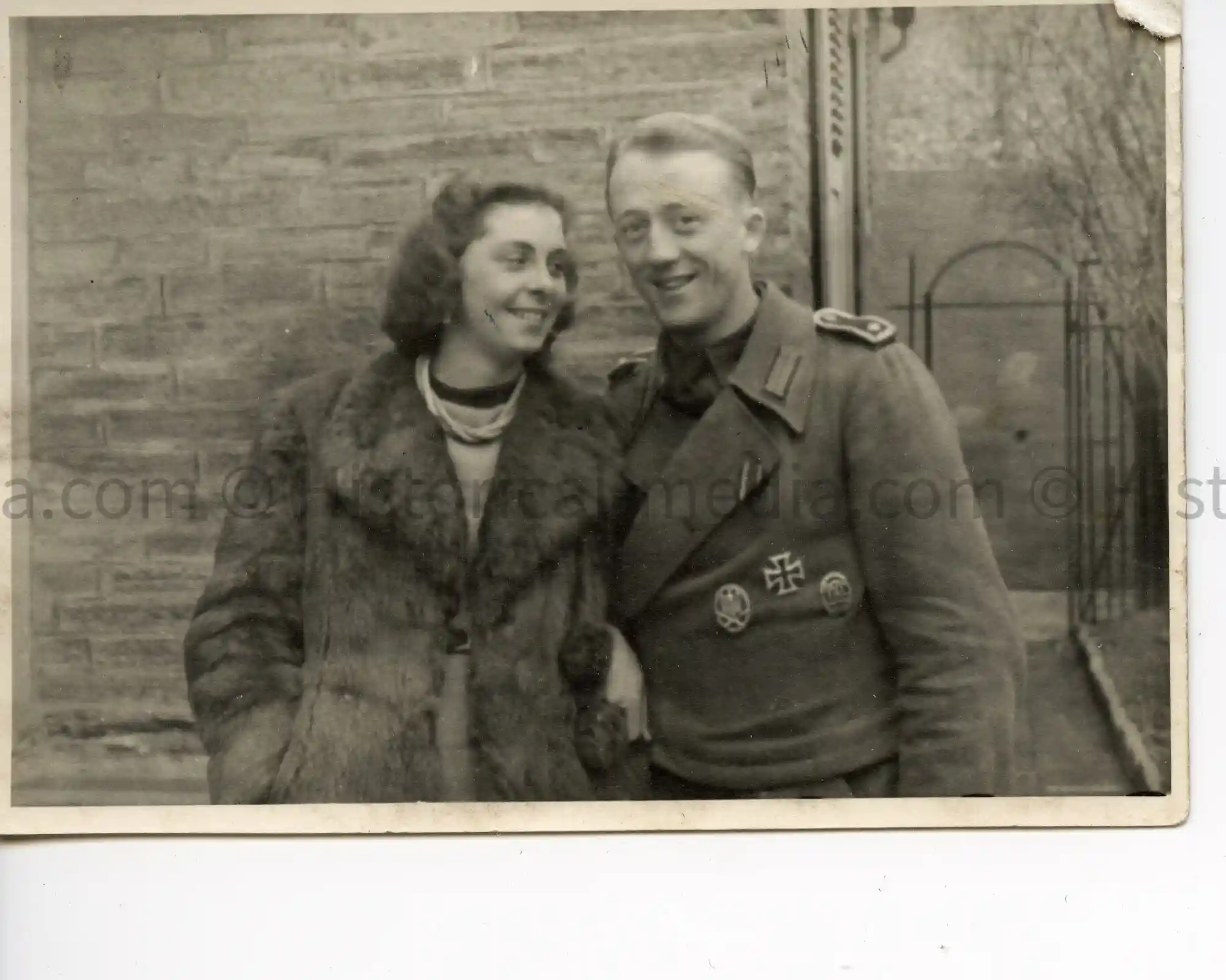 WWII GERMAN PHOTO STURMGESCHÜTZ SOLDIER IN WRAP TUNIC W/ MEDALS