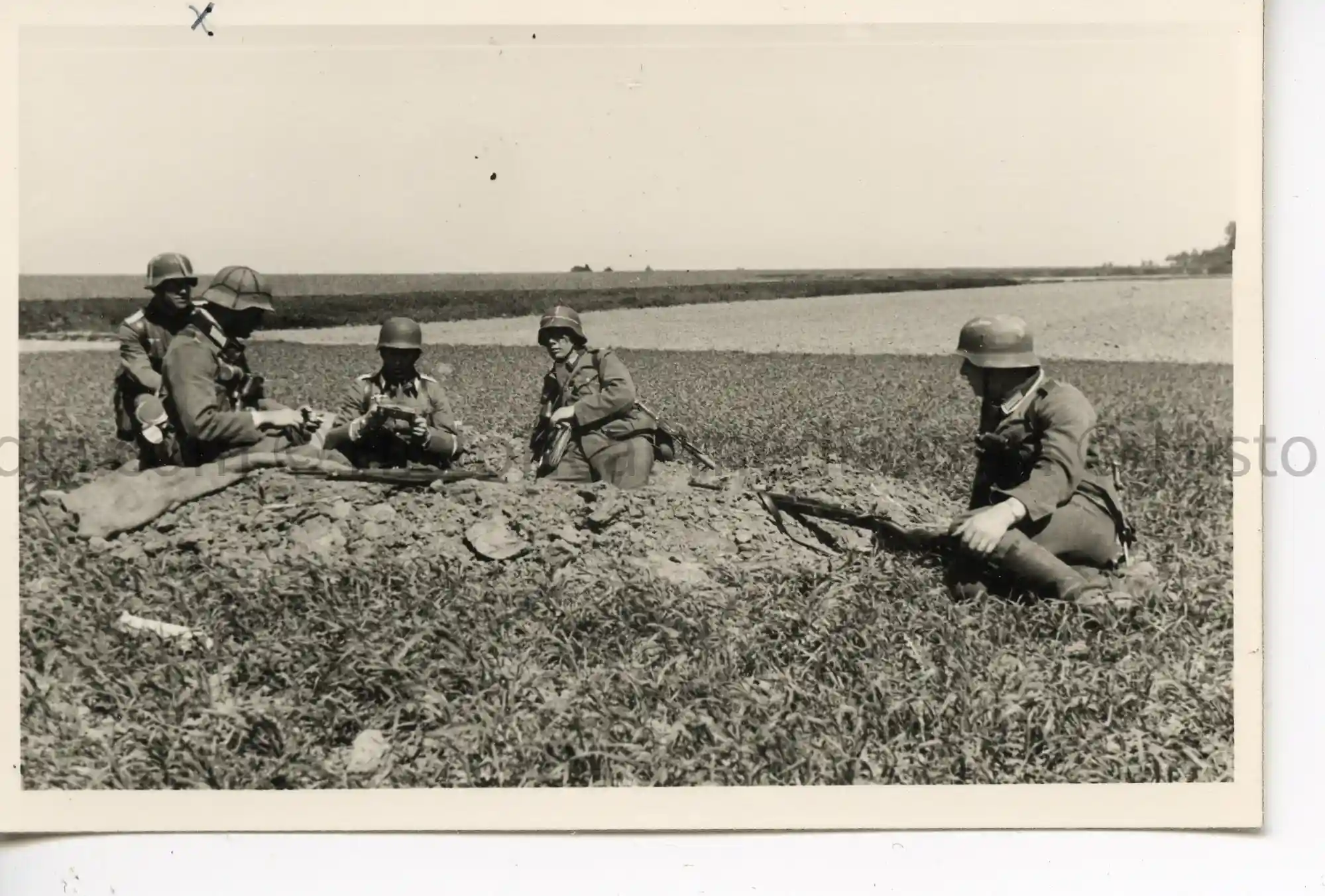 WWII GERMAN PHOTO SOLDIERS IN FOXHOLE IN THE FIELD - FRANCE 1940 - HELMET STRAP VARIATIONS