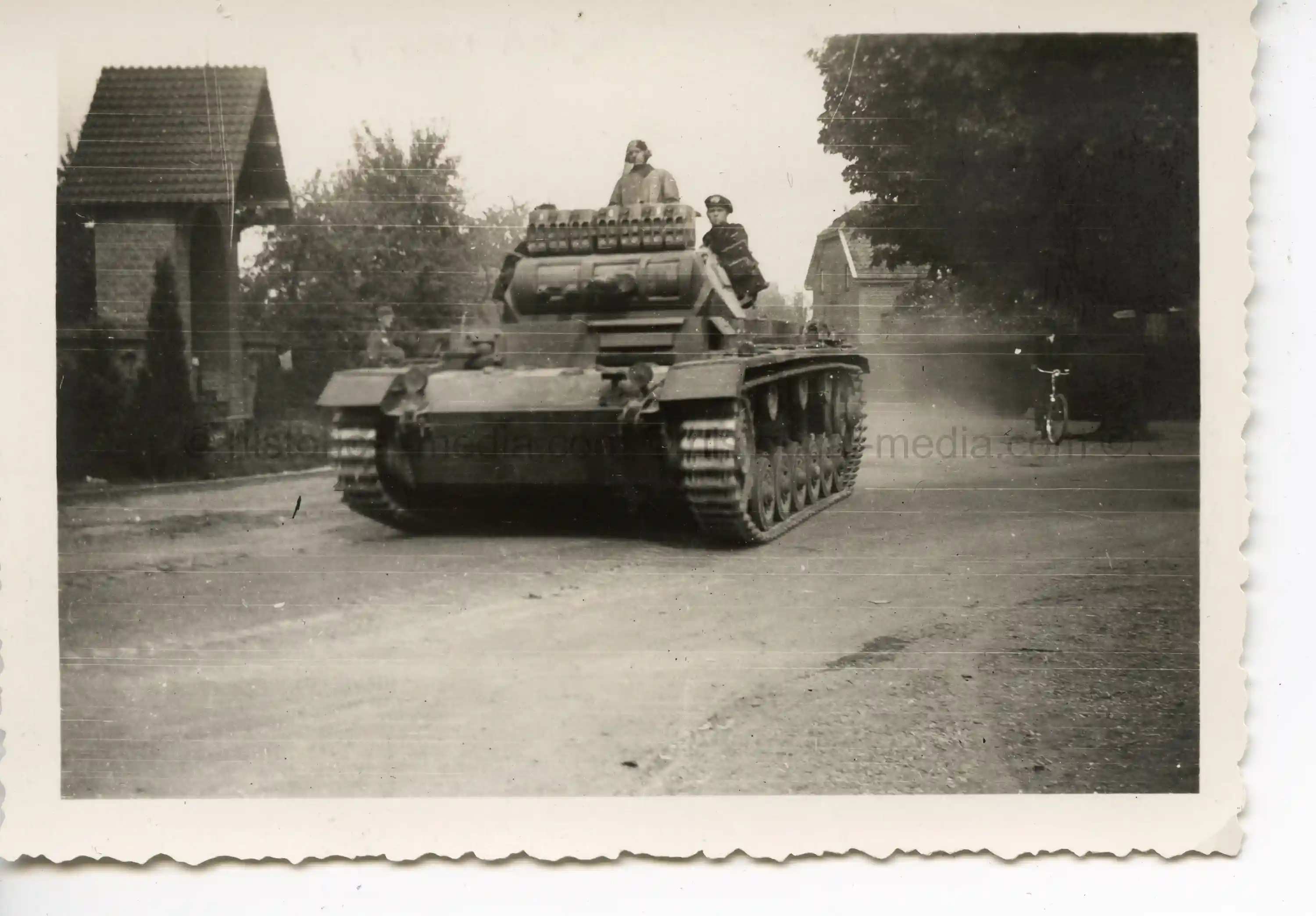 GERMAN PHOTO OF A PANZER III TANK IN ACTION IN POLAND 1939
