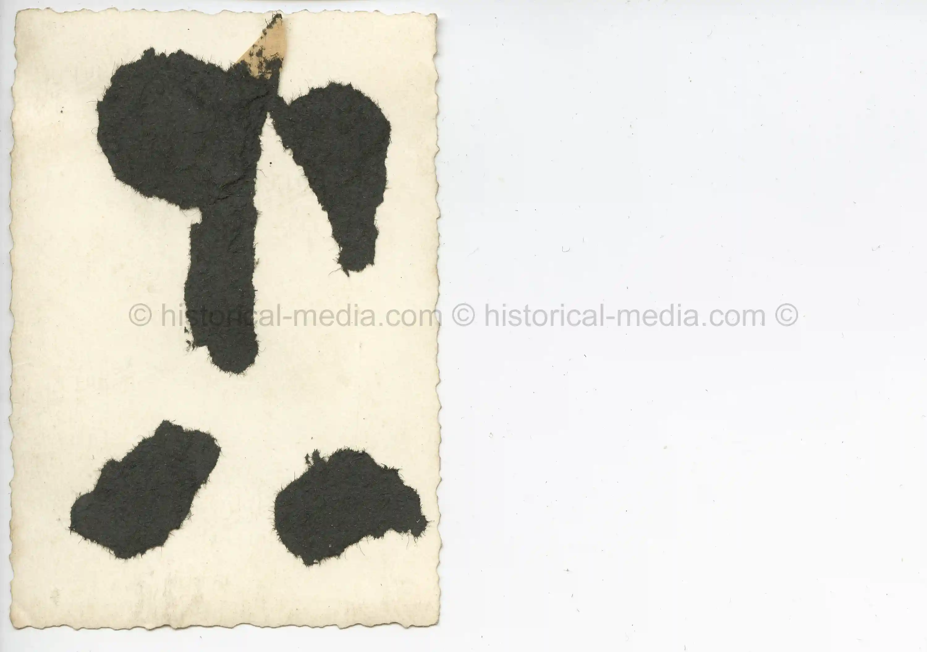 PHOTO OF GERMAN SOLDIER IN BURNED BUILDING W LUGER