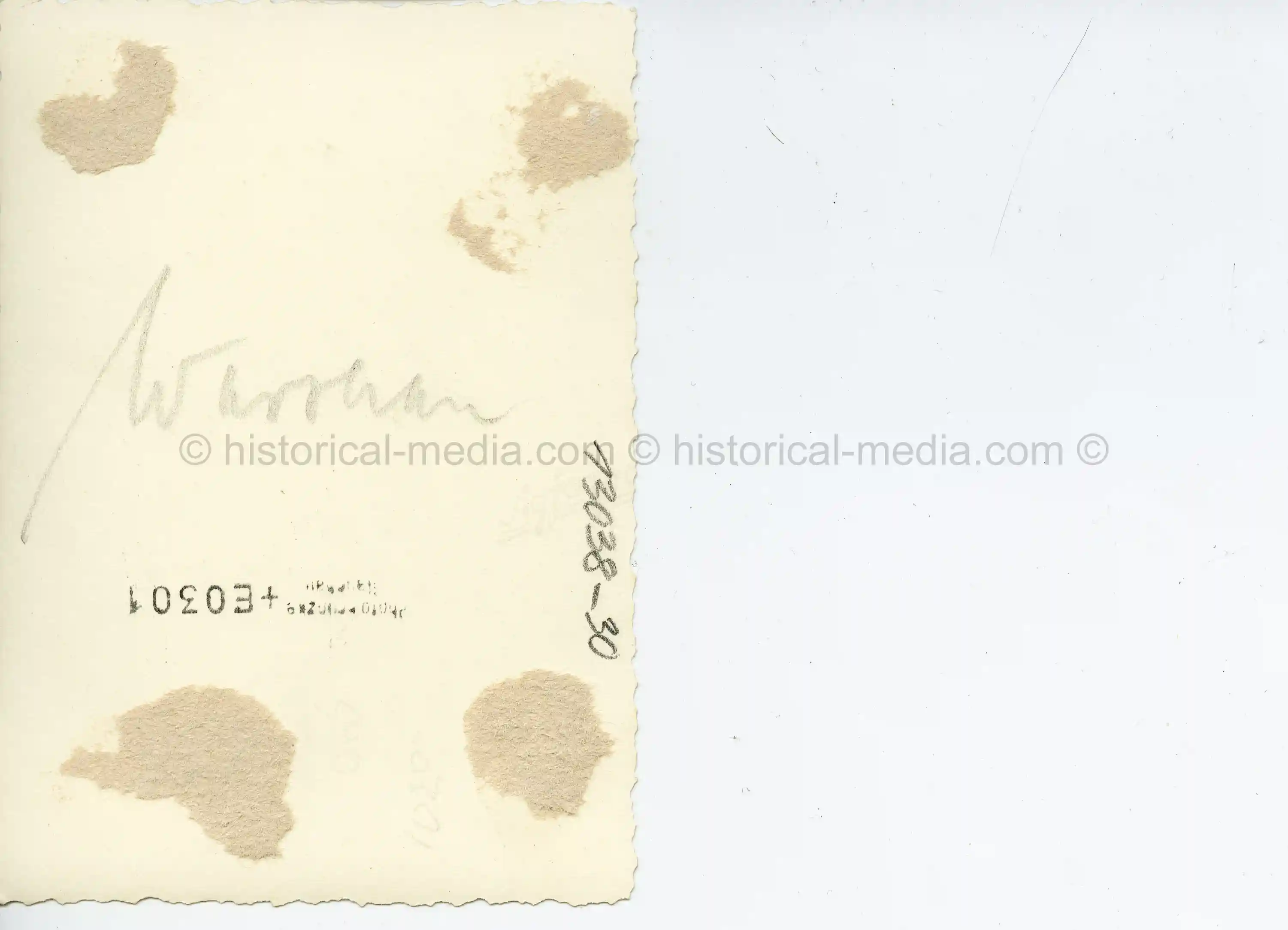 PHOTO OF WARSAW JEWS TAJEN BY GERMAN SOLDIER IN GHETTO