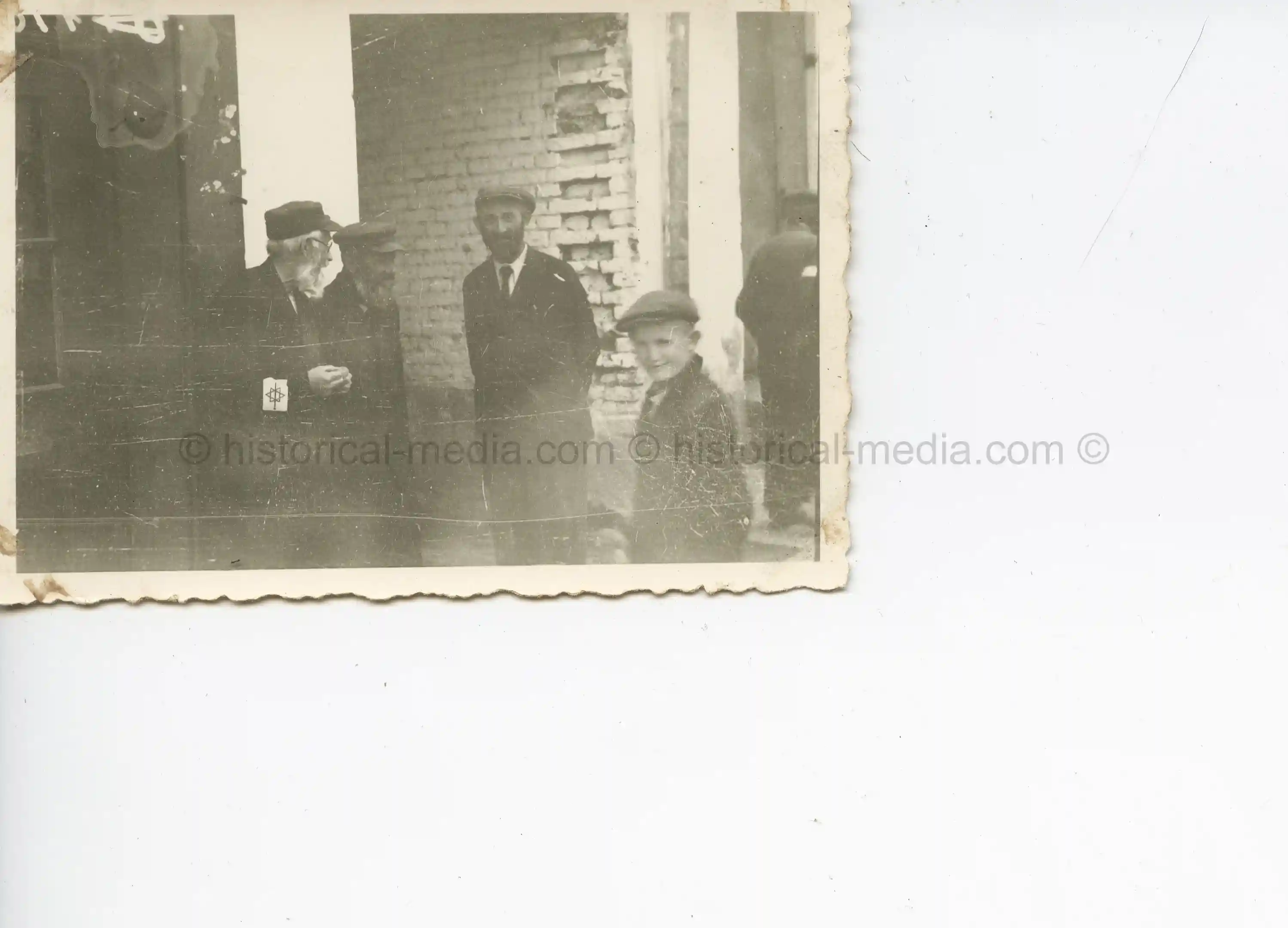 GERMAN SOLDIER PHOTO OF JEWISH MEN WEARING ARMBAND