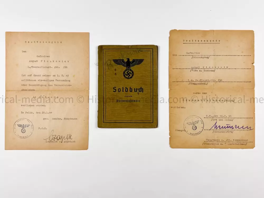 HEER SOLDBUCH & AWARD DOCUMENT GROUPING - HEERES FLAK - 7. PANZER DIVISION - KURLAND